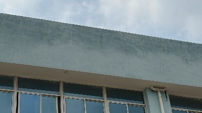 厂房外墙渗漏：生产隐忧，仿石漆翻新精准修复方案