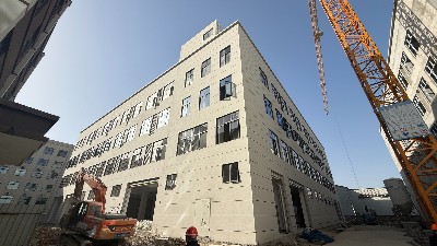 安徽毛毛商贸外墙新建：科创美绘彩石仿石漆带来的美学